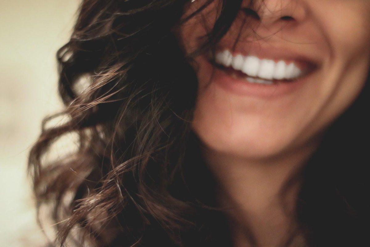 Closeup cropped photo of a woman laughing