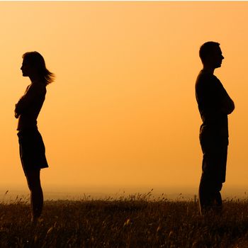 Silhouette of a angry woman and man on each other.Relationship difficulties