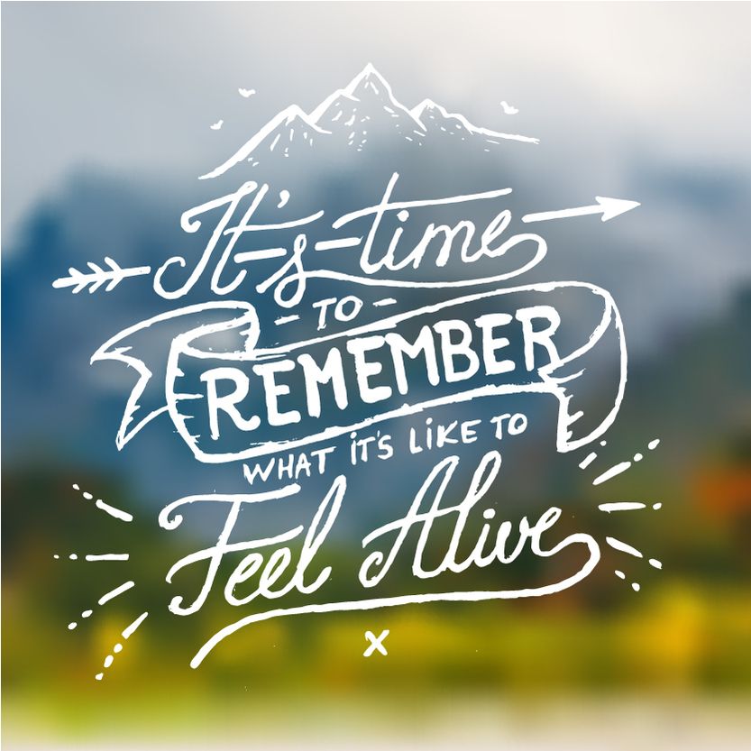 It's Time to Remember what it's like to Feel Alive - Inspirational quote on blurred mountain background. Hand written calligraph
