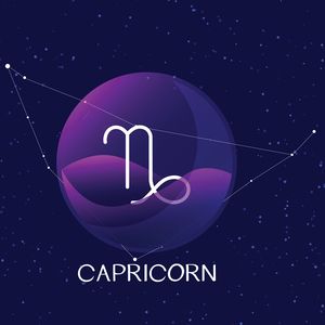 tarry sky with capricorn zodiac constellation behind glass sphere with encapsulated capricorn sign and constellation name.